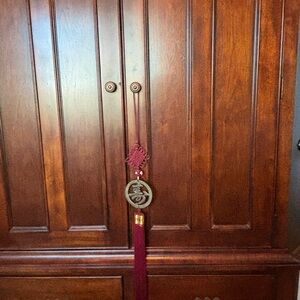 Korean hanging with brass symbol